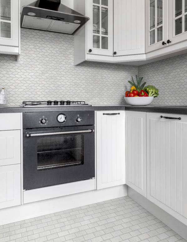 Light  kitchen with canopy and white furniture