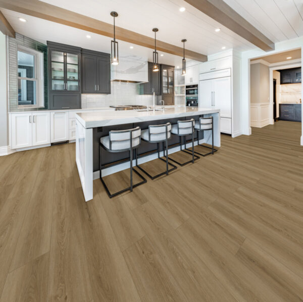 Luxurious high end kitchen with stainless appliances marble and glass tile